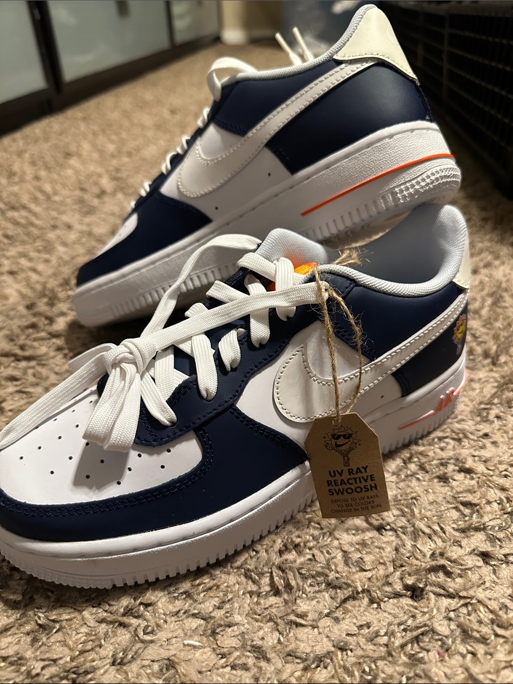 Nike Kids Navy and White Low-Top Sneakers with Orange Accent
